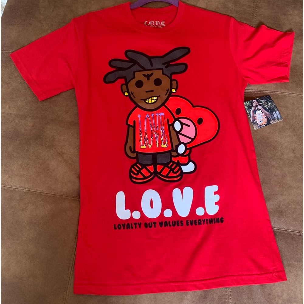Red man’s shirt. Size small. Brand new with tag. From Hubert sports.